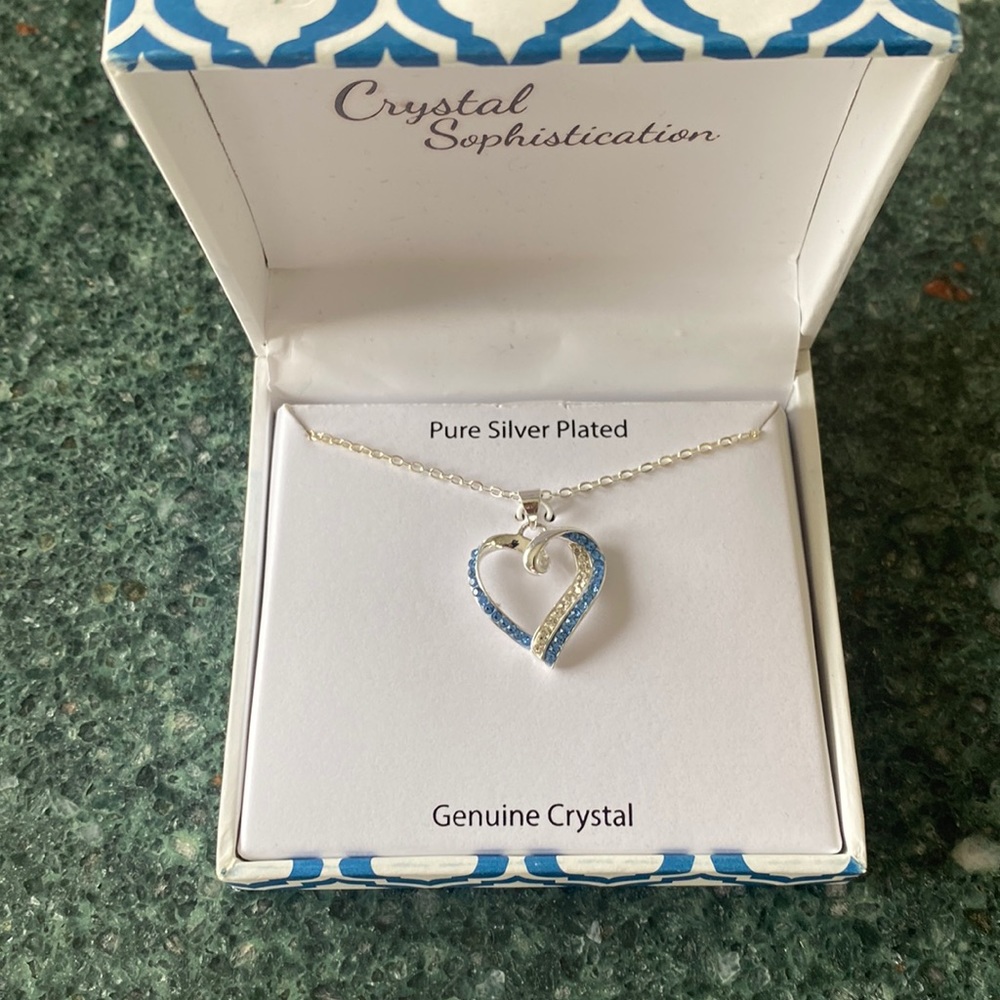 Silver necklace with crystal heart pendant . New.